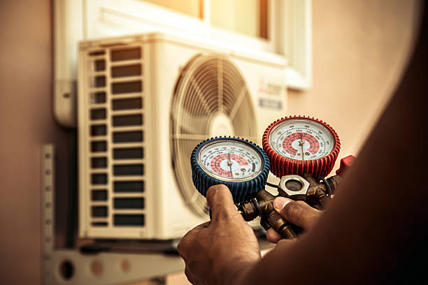 Professional Heat Pump Repair technician working in Hinckley, IL